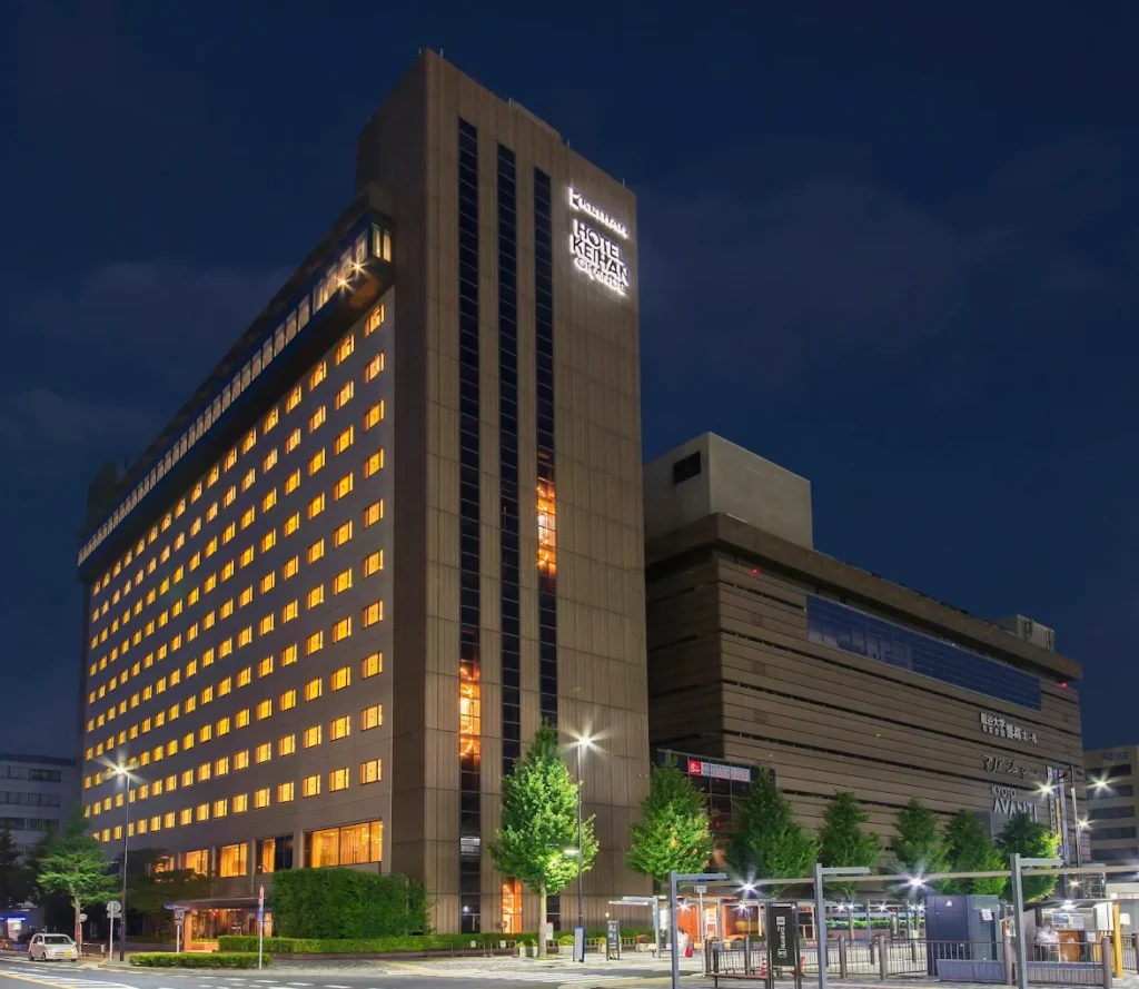 10 Best Hotels Near Fushimi Inari Shrine 12 Hotel Keihan Kyoto Grande exterior at night near Kyoto Station, offering convenient access to Fushimi Inari Shrine and Kyoto's major attractions.