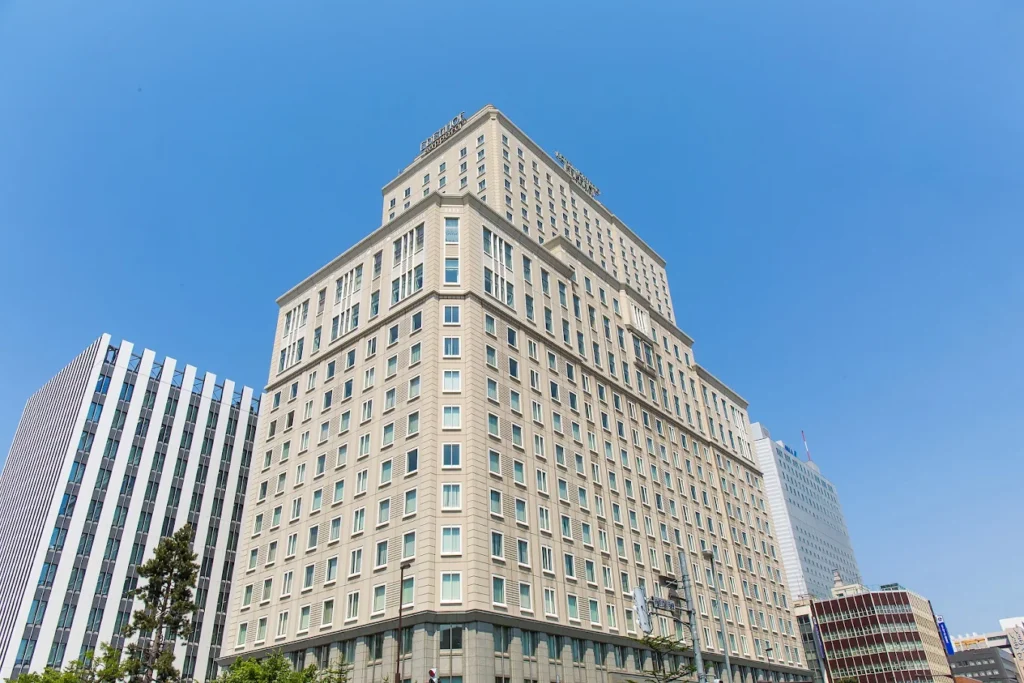 Exterior view of Hotel Monterey Edelhof Sapporo with elegant European-inspired architecture in central Sapporo, Japan