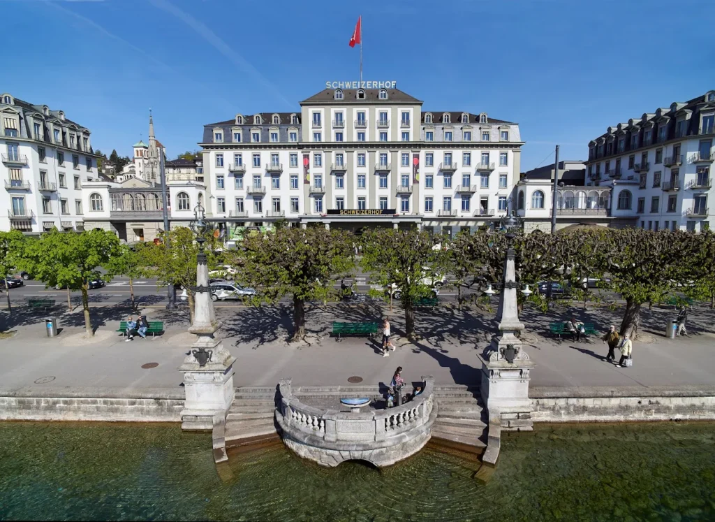 Hotel Schweizerhof Luzern facing Lake Lucerne in Switzerland with historic architecture and waterfront promenade