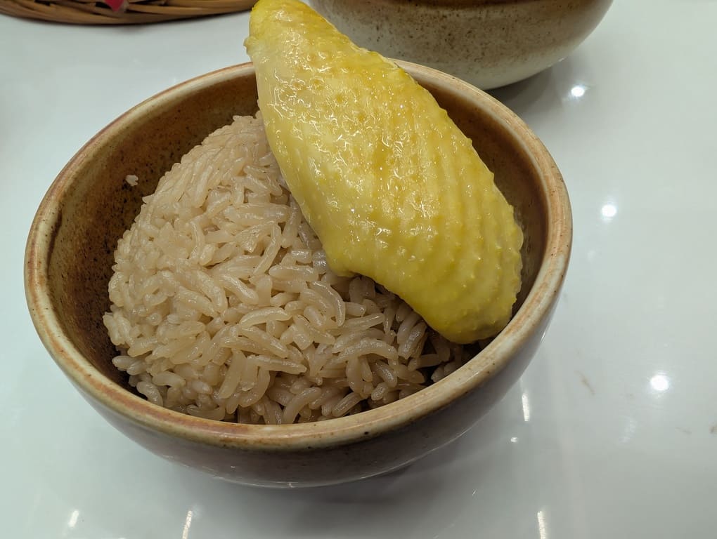 Mr Hainan VivoCity Review: Surprisingly Good Chicken Rice in Singapore 7 Fragrant Hainanese chicken rice topped with a piece of poached chicken at Mr Hainan VivoCity.