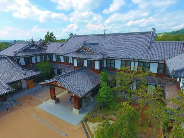 8 Best Hotels Near Nara Park: Luxury, Ryokan & Budget Stays 11 Historic Nara Hotel building with traditional Japanese architecture surrounded by greenery in Nara Japan
