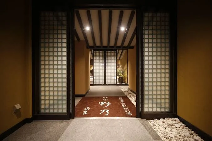 8 Best Hotels Near Nara Park: Luxury, Ryokan & Budget Stays 10 Traditional Japanese-style entrance corridor at Onyado Nono Nara Natural Hot Spring with tatami-inspired interior design