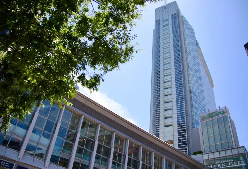 Exterior view of Shibuya Excel Hotel Tokyu beside Shibuya Mark City on a sunny day in central Tokyo.