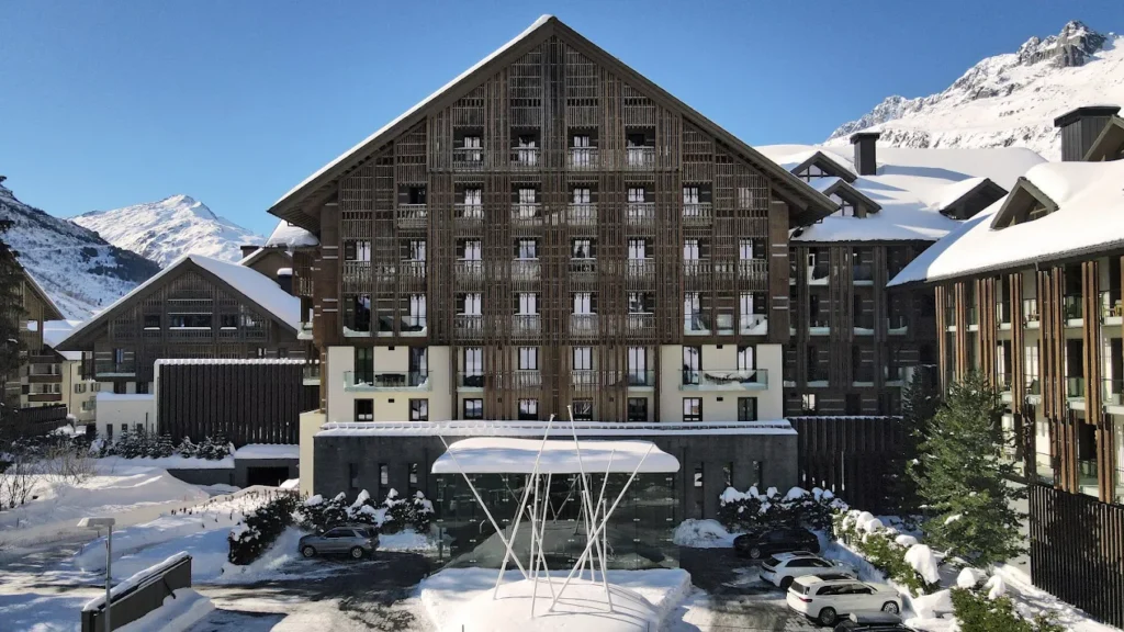 The Chedi Andermatt luxury mountain resort surrounded by snowy Swiss Alps in Andermatt Switzerland