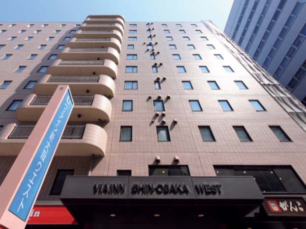 Exterior facade of Via Inn Shin-Osaka West hotel building near Shin-Osaka Station in Osaka, Japan