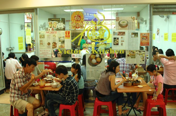 Where to Find the Best Dim Sum in Singapore (Local Picks) 9 Diners enjoying dim sum inside Victor's Kitchen, a popular Hong Kong-style eatery in Singapore known for its lava buns.