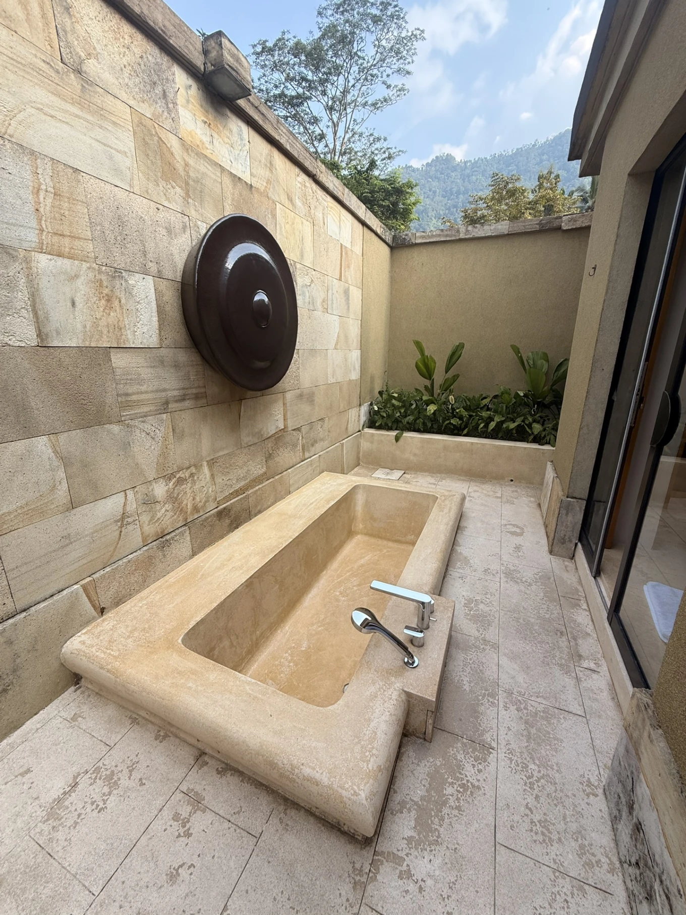 Amanjiwo Review: Is This Luxury Resort Near Borobudur Worth It? 25 Outdoor stone bathtub at Amanjiwo pool suite in Central Java Indonesia