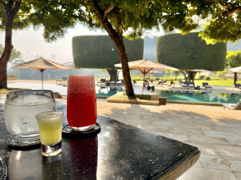Amanjiwo Review: Is This Luxury Resort Near Borobudur Worth It? 12 Fresh welcome drinks beside the Amanjiwo swimming pool in Borobudur Indonesia