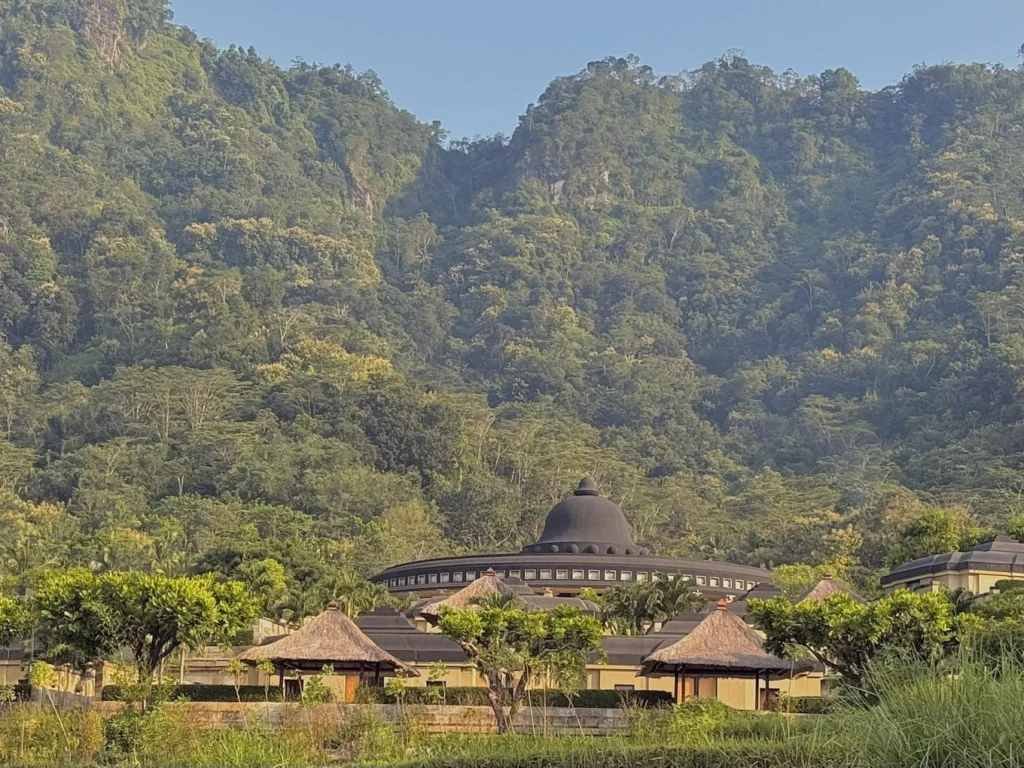 Amanjiwo Review: Is This Luxury Resort Near Borobudur Worth It? 8 Amanjiwo resort surrounded by lush jungle hills near Borobudur in Central Java