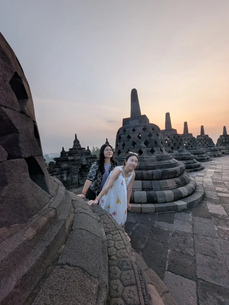 Amanjiwo Review: Is This Luxury Resort Near Borobudur Worth It? 35 Two women exploring Borobudur Temple stupas during sunrise