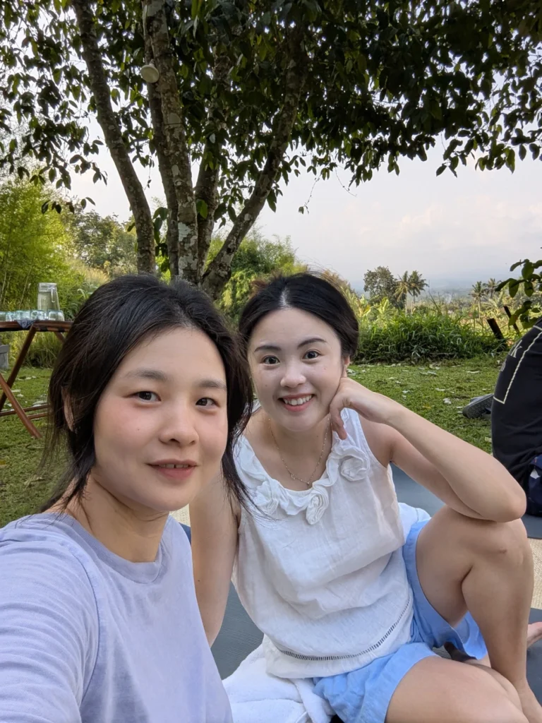 Amanjiwo Review: Is This Luxury Resort Near Borobudur Worth It? 42 Two women relaxing outdoors during wellness activity at Amanjiwo resort