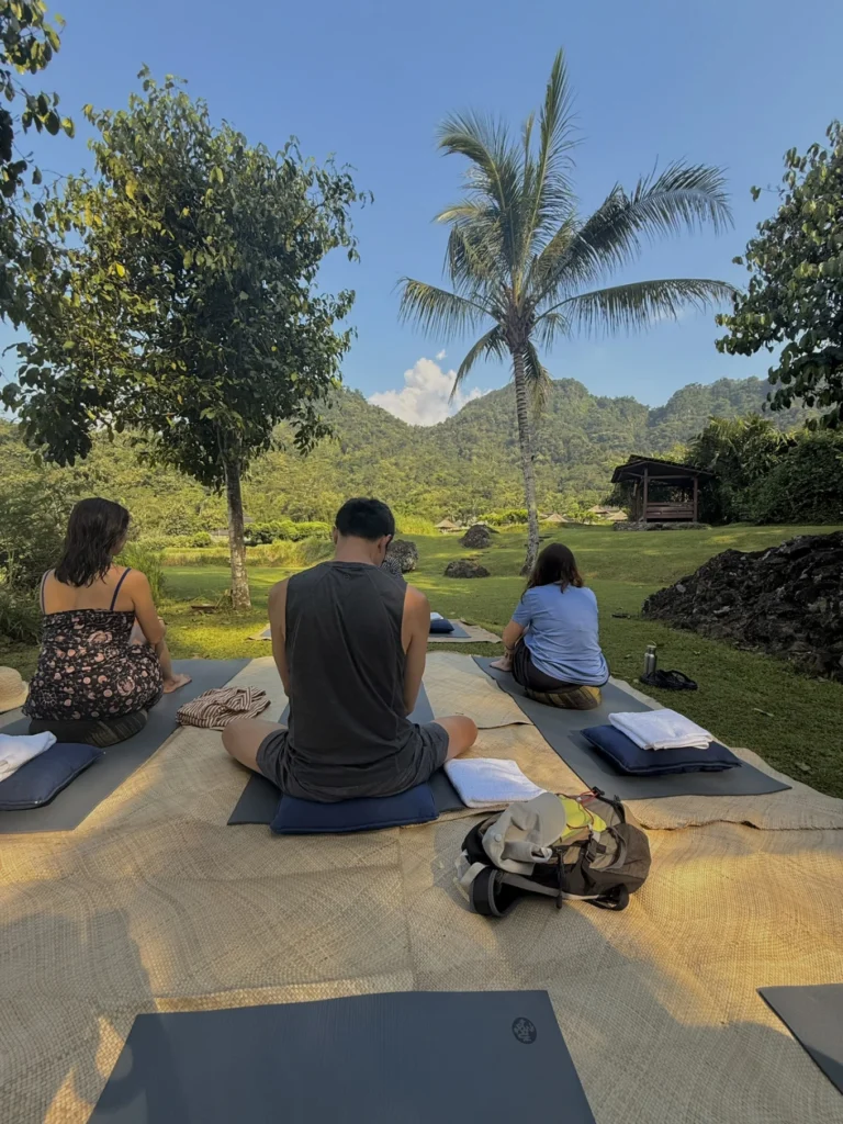 Amanjiwo Review: Is This Luxury Resort Near Borobudur Worth It? 41 Outdoor meditation and wellness session at Amanjiwo with mountain views