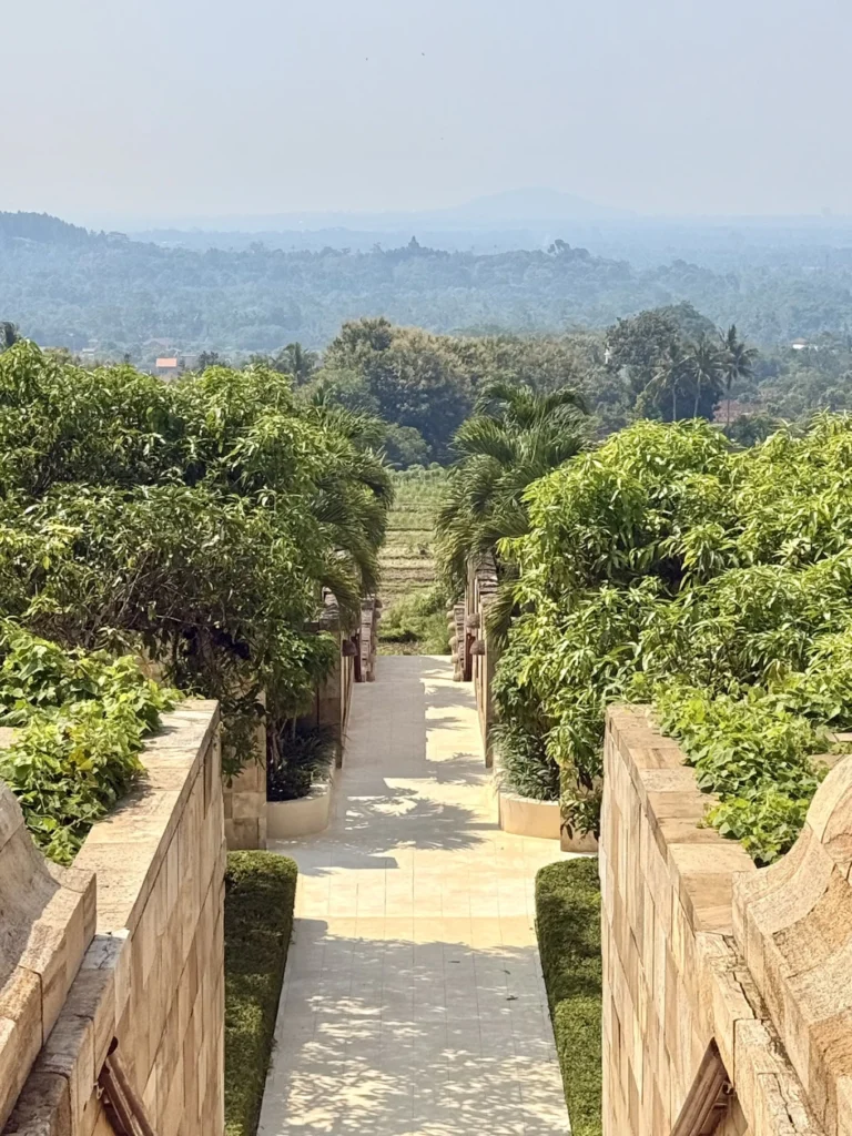 Amanjiwo Review: Is This Luxury Resort Near Borobudur Worth It? 9 Stone pathway and tropical landscape at Amanjiwo resort near Borobudur in Central Java