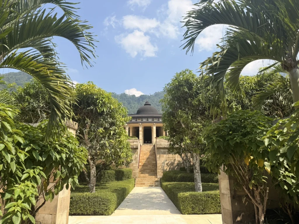 Amanjiwo Review: Is This Luxury Resort Near Borobudur Worth It? 10 Main dome building at Amanjiwo resort surrounded by lush tropical plants in Indonesia