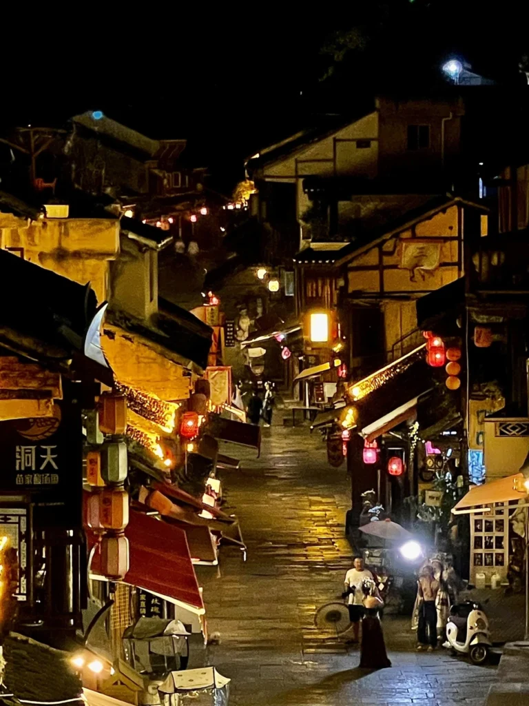 Qingyan Ancient Town Guide: Food, Night Views & Where to Stay 14 Elevated night view of lantern-lit streets in Qingyan Ancient Town, Guizhou.