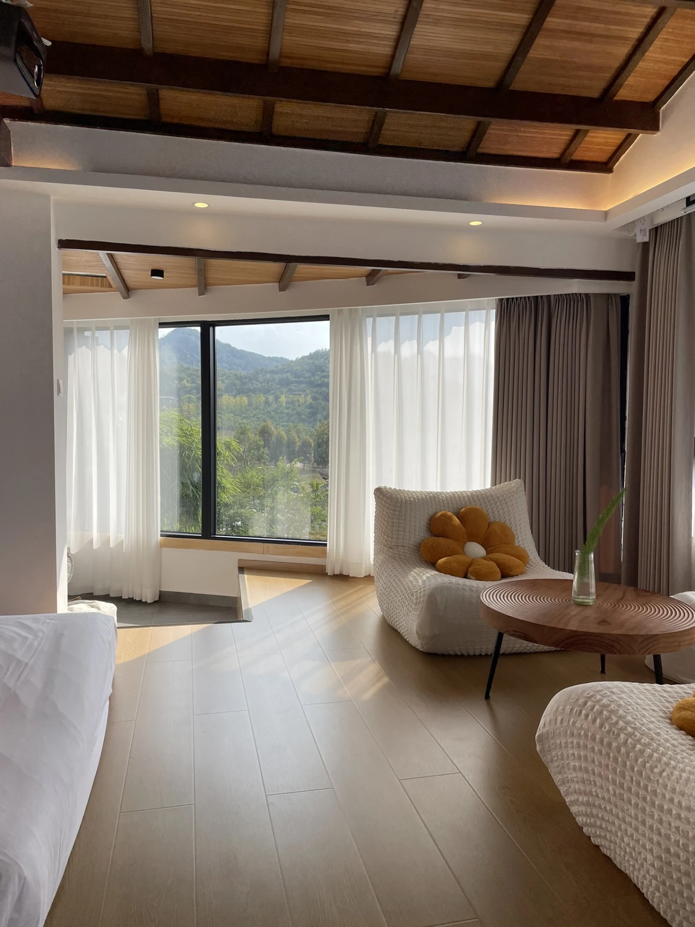 Spacious family room with mountain view windows at Qishe Inn in Qingyan Ancient Town