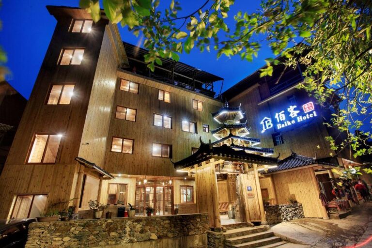 Baike Boutique Hotel illuminated at night in Ping’an Village near the Longji Rice Terraces, China