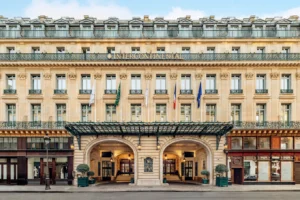 Grand exterior of InterContinental Paris Le Grand near Opéra Garnier, featuring its historic Haussmann-style façade and arched entrance.