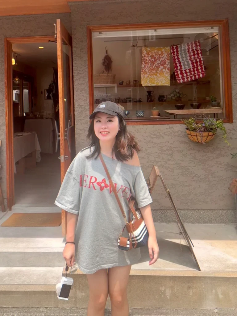 7-Day Osaka, Kyoto and Kobe Itinerary: Food, Shopping and Summer Sights 24 Woman standing outside a small craft and ceramics shop in Kyoto’s historic Higashiyama district.