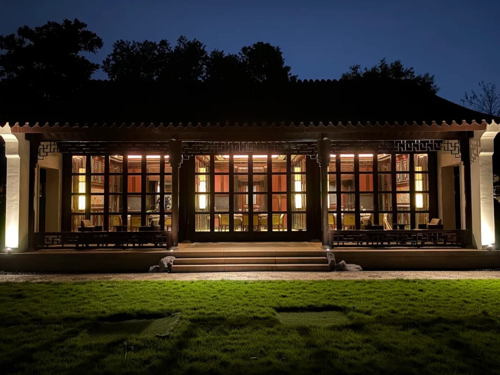 Traditional courtyard building at Four Seasons Hotel Hangzhou at West Lake illuminated at night