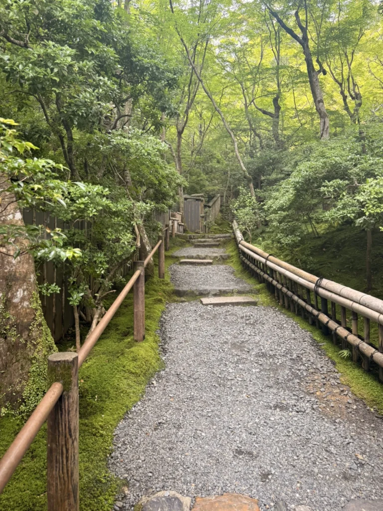 Gioji Temple Kyoto: Is the Moss Garden Worth Visiting? 7 Gravel path lined with moss and bamboo railings at Gioji Temple