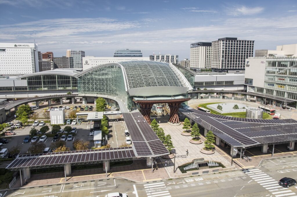 Aerial view of Kanazawa Station and the iconic Tsuzumi Gate, the city's main transportation hub and one of the best areas to stay in Kanazawa for first-time visitors.
