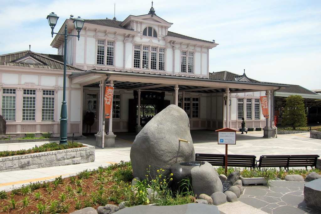 Historic JR Nikko Station building in Nikko, Japan, featuring traditional Japanese-inspired architecture and serving as the main gateway to Nikko's UNESCO World Heritage attractions.