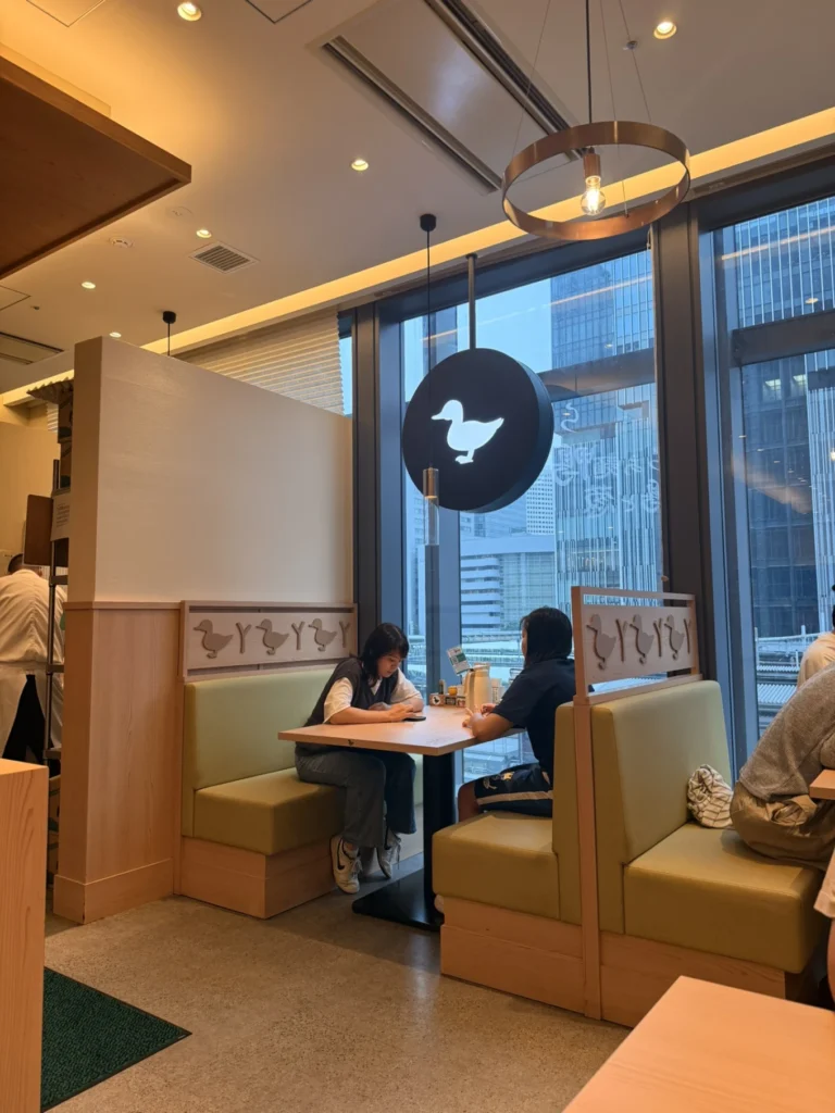 Interior seating area at Ramen Kamo to Negi Osaka Umeda inside Inogate Osaka