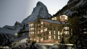 THE OMNIA luxury hotel beneath the snow-covered Matterhorn in Zermatt, Switzerland