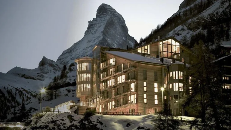 THE OMNIA luxury hotel beneath the snow-covered Matterhorn in Zermatt, Switzerland