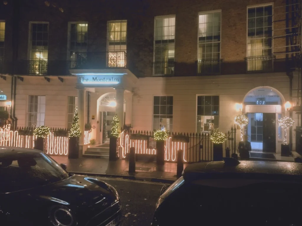 10 Best Muslim-Friendly Hotels (Halal) in London 7 Front entrance of The Montcalm Marble Arch hotel in London illuminated at night with festive lights, located just steps from Oxford Street and Edgware Road.