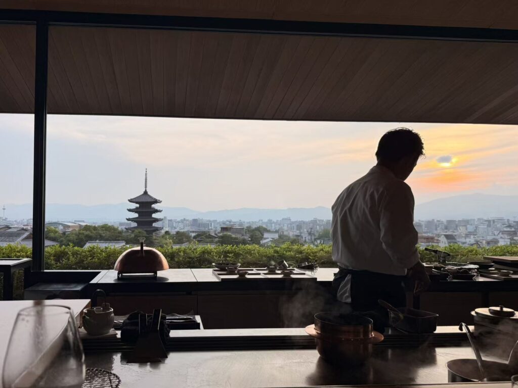The Best Sunset View in Kyoto? Yasaka at Park Hyatt Kyoto Review 6 Chef preparing dinner with Yasaka Pagoda view during sunset at Park Hyatt Kyoto