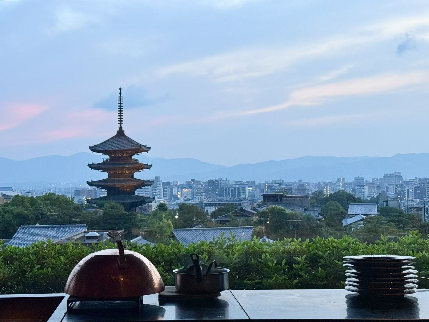 Twilight view of Yasaka Pagoda from the teppanyaki counter at Park Hyatt Kyoto