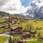 Boutique Hotel Glacier overlooking alpine meadows and mountains in Grindelwald