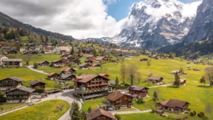 Boutique Hotel Glacier overlooking alpine meadows and mountains in Grindelwald