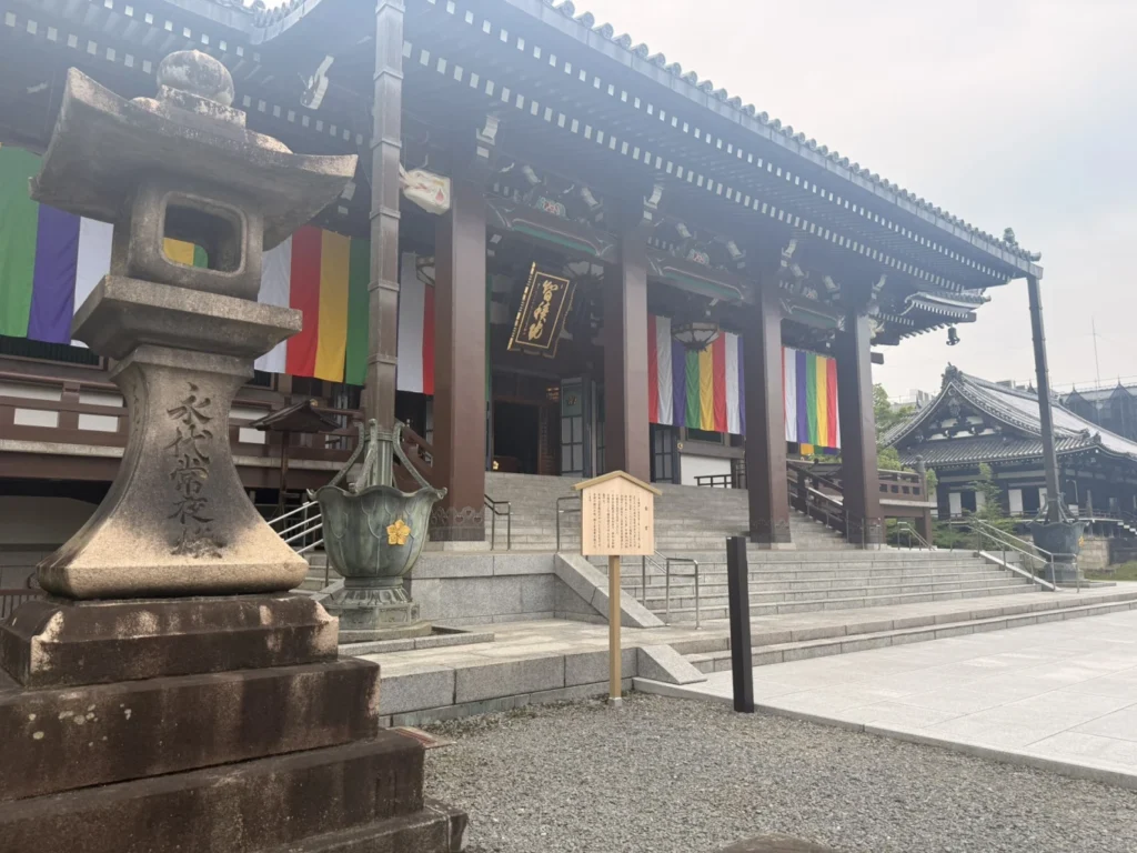 Main temple building and stone lantern at Chishaku-in Temple in Kyoto