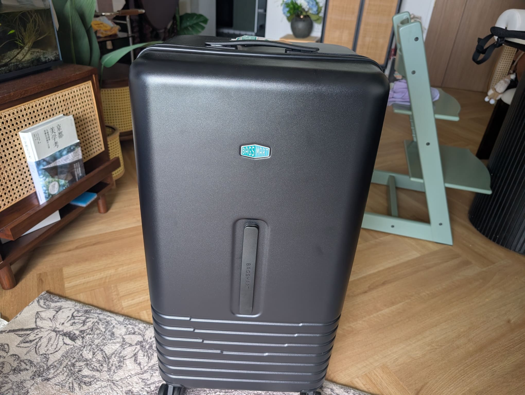 agsmart Getaway 30 Trunk black checked luggage viewed from the front
