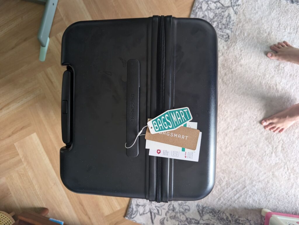 Bagsmart Getaway 30 Trunk Review: A Hands-On First Look at This 96L Checked Luggage 6 Top view of Bagsmart Getaway 30 Trunk with product tags attached