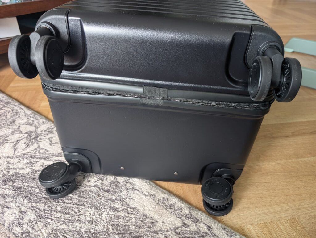 Bagsmart Getaway 30 Trunk Review: A Hands-On First Look at This 96L Checked Luggage 17 Bagsmart Getaway 30 Trunk double spinner wheels viewed from underneath