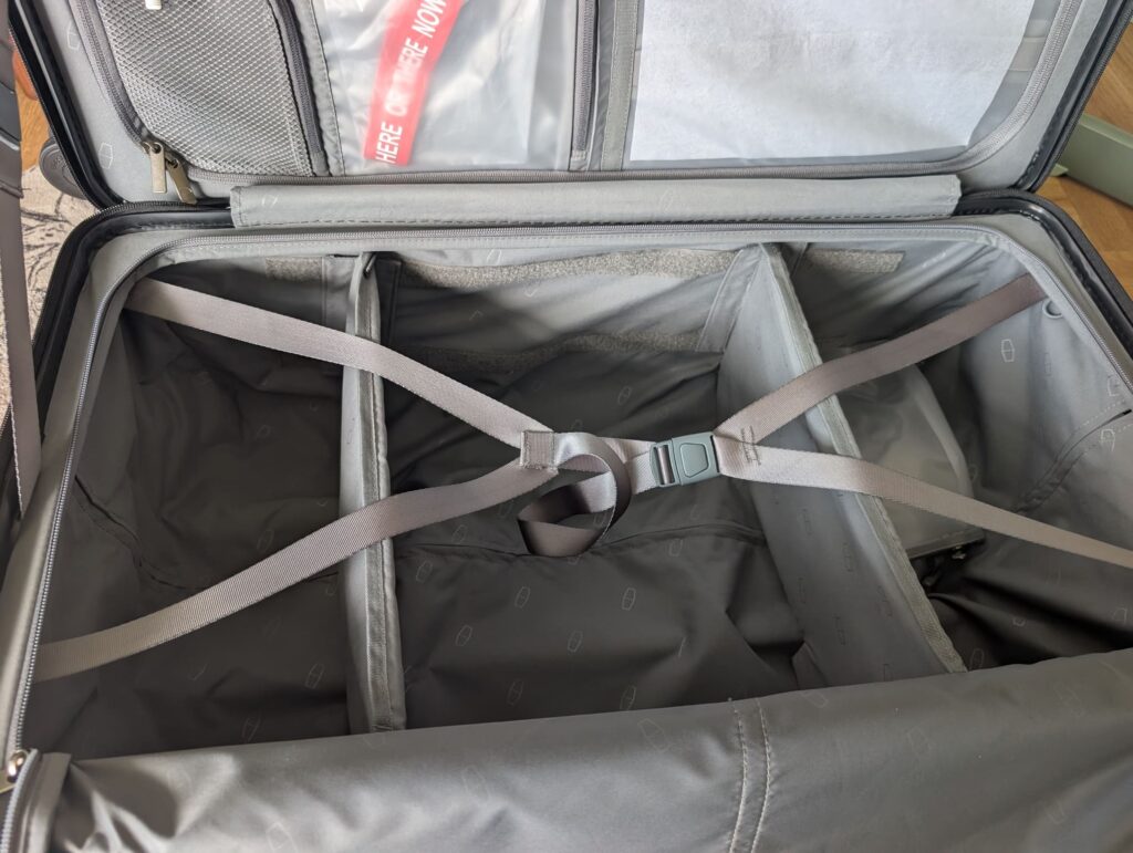 Bagsmart Getaway 30 Trunk Review: A Hands-On First Look at This 96L Checked Luggage 11 Interior of Bagsmart Getaway 30 Trunk with dividers and compression straps
