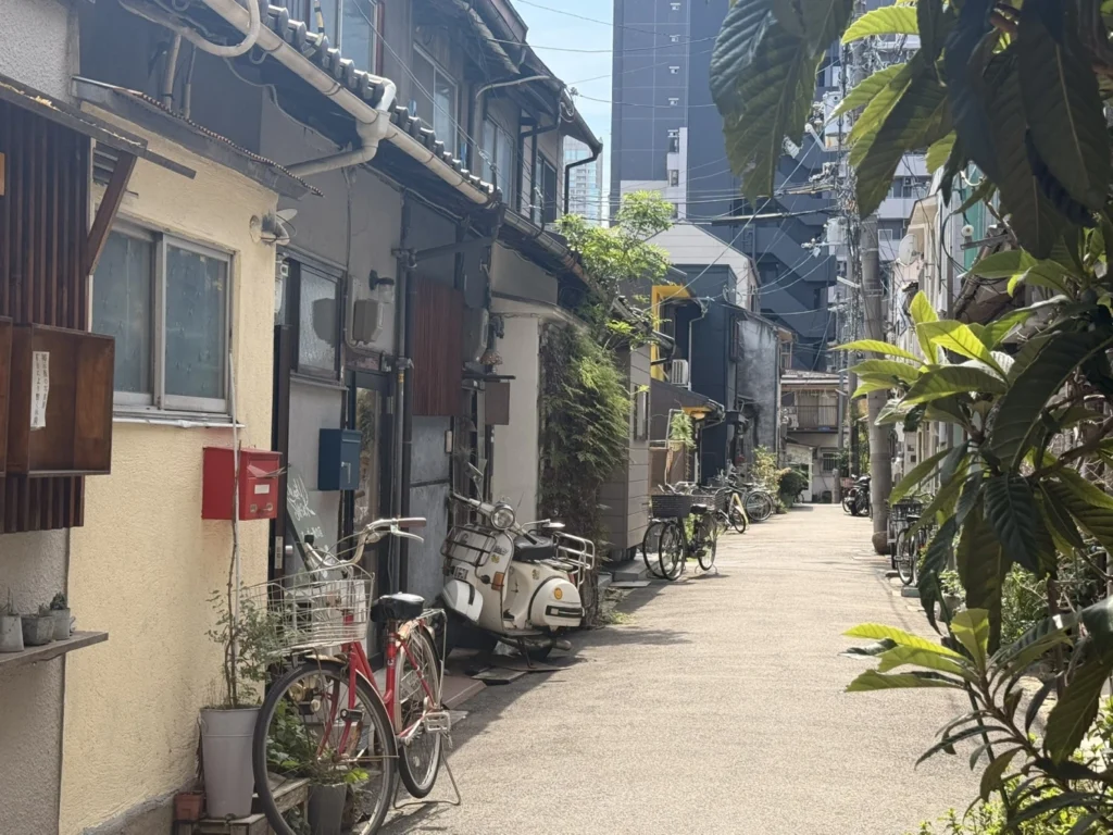 Nakazakicho Osaka City Walk: Exploring Osaka's Retro Neighbourhood 6 Traditional houses and bicycles along a narrow Nakazakicho alley in Osaka