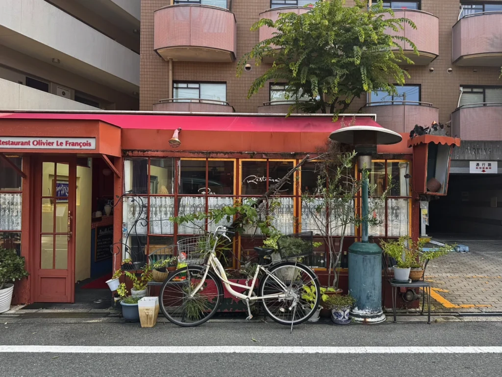 Nakazakicho Osaka City Walk: Exploring Osaka's Retro Neighbourhood 20 Red neighbourhood restaurant with bicycle outside in Nakazakicho Osaka