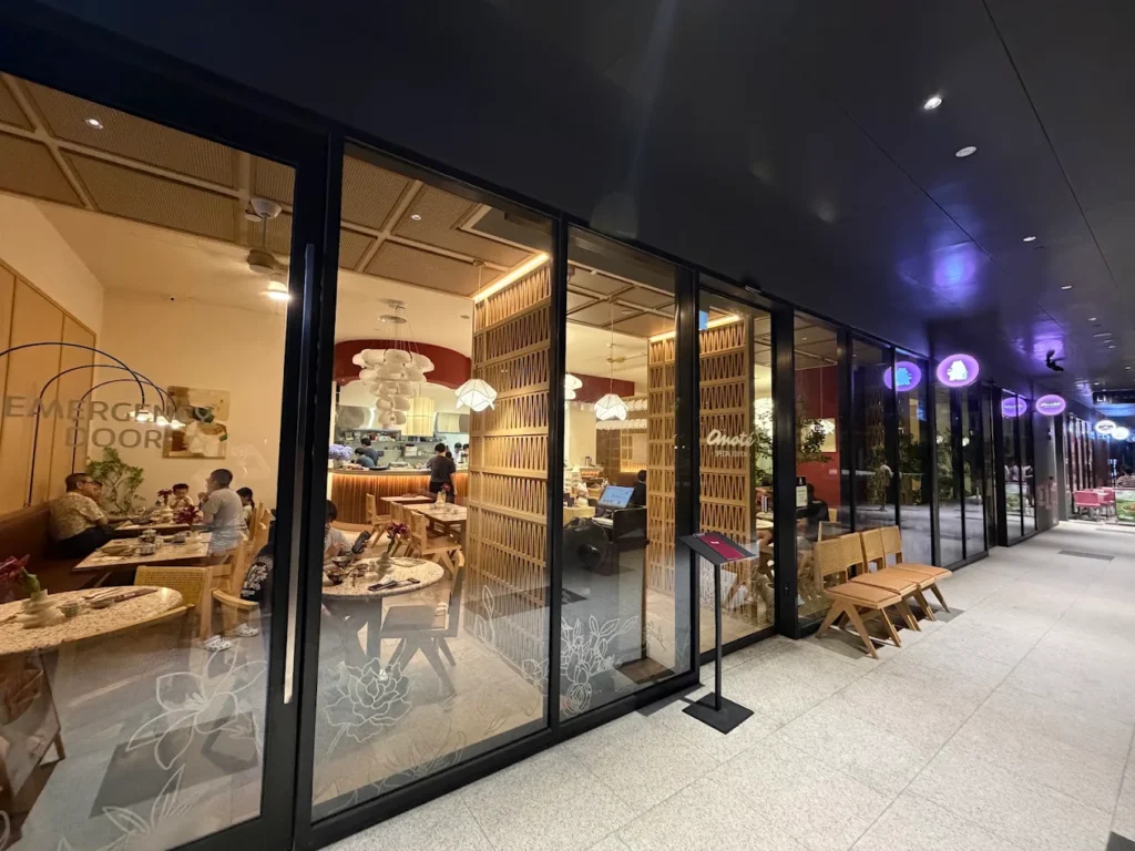 Lentor Modern Food Guide: 17 Best Places To Eat Near Lentor MRT 8 Omoté: Special Edition Japanese restaurant at Lentor Modern, featuring glass-fronted dining, warm lighting and modern wooden interiors.