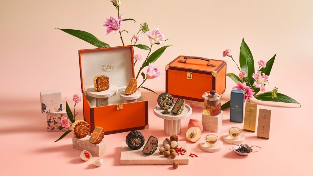 PARKROYAL COLLECTION Marina Bay 2026 mooncakes with traditional baked and charcoal varieties in orange luxury gift boxes