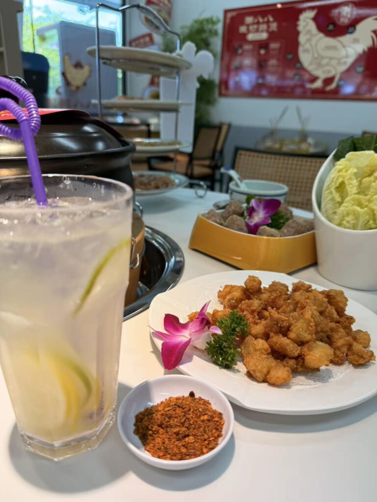 Chao Baba Freshly Cut Chicken Pot Review at SAFRA Punggol 13 Fried chicken soft bones with chilli seasoning and a chilled citrus drink at Chao Baba.