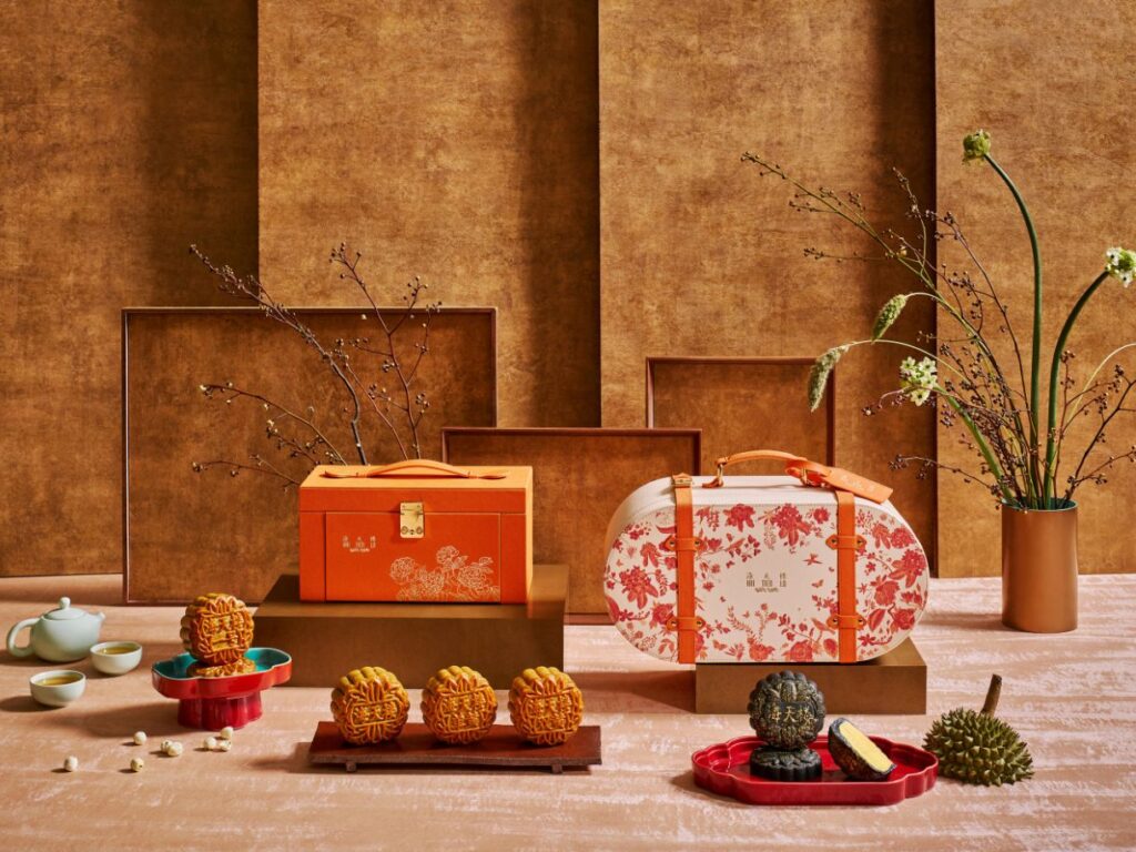 Pan Pacific Singapore Hai Tien Lo mooncakes with traditional baked and durian varieties in luxury Mid-Autumn gift boxes