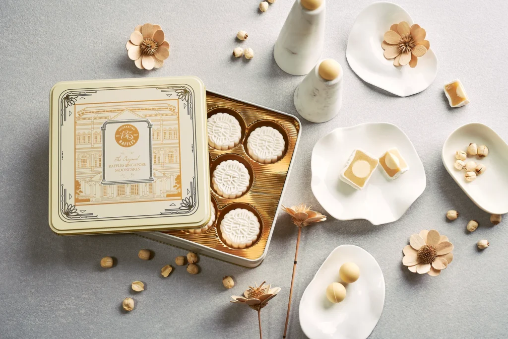 Raffles Singapore snowskin mooncakes presented in a heritage-inspired gift tin for Mid-Autumn Festival 2026